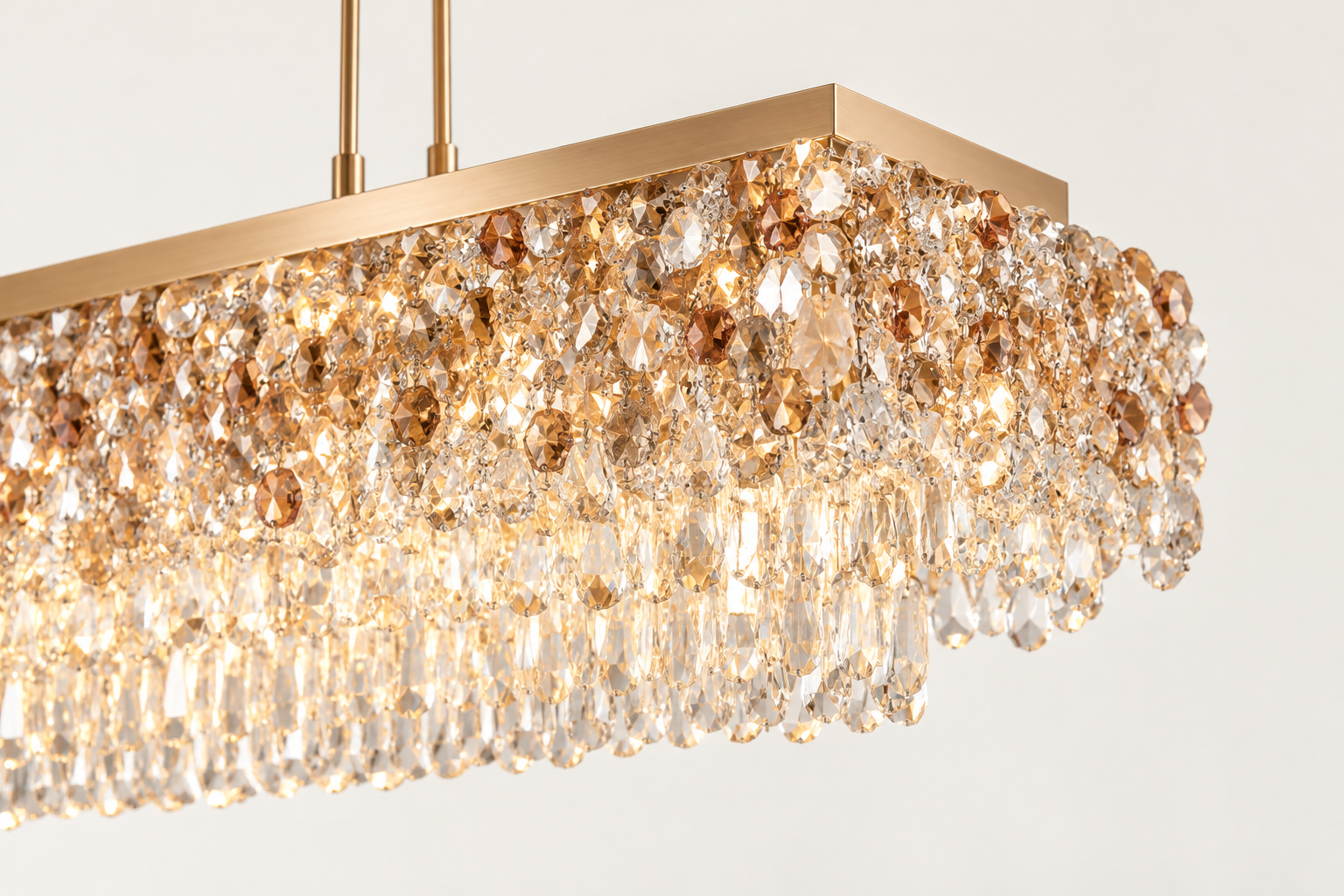 Close view of a rectangular gold crystal chandelier
