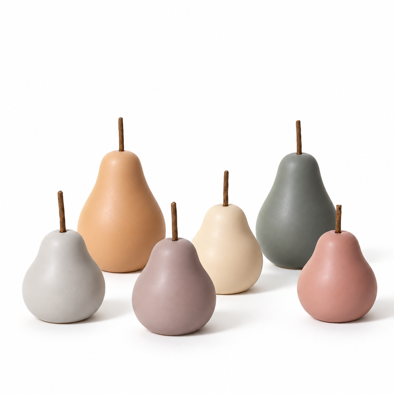 Decorative pear sculptures in soft neutral colours